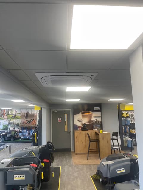 Ceiling cassette air conditioning installed in an office reception